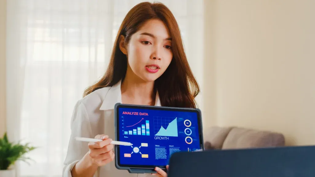 Importance Of Digital Marketing Agency For Small Businesses 4 asia businesswoman using laptop tablet presentation colleagues about plan video call while working from home living room self isolation social distancing quarantine coronavirus